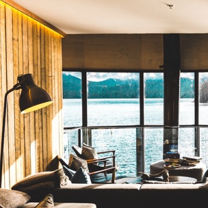 Beach house looking out to ocean through windows